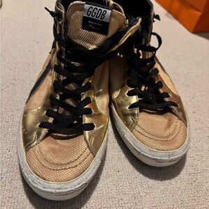 Golden Goose Gold and Black Sneakers